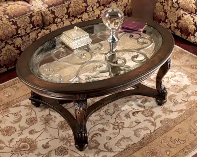 Oval Coffee Table by Ashley, View more