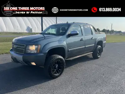 LTZ Z71 4x4 with V8 engine and automatic transmission. Full-size 4x4 truck with versatile midgate be...