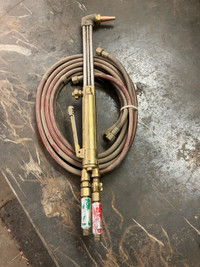 Cutting torch and hoses 75$