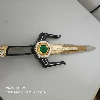 Relive the nostalgia with this Magna Defender Sword from Power Rangers Lost Galaxy! This toy sword c...