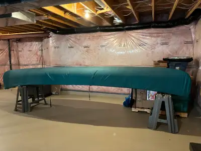 Selling my meticulously handcrafted 16ft cedar strip canoe, a true testament to artisanal boatbuildi...