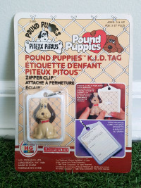 Brand New Sealed 1986 Pound Puppies Kid Tag / Zipper Clip