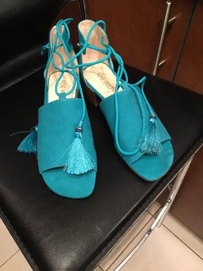 Women's turquoise size 7 Nine West brand new never worn sandals tie up with tassels. Retail price $1...