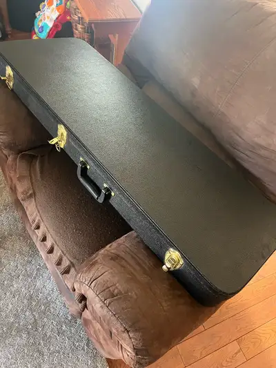, fender strat /tele or PRs hardshell guitar case. Fits most any solid body guitar 100$ .