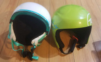 2 ski / snowboarding helmets, sizes S (green) and XS (wh