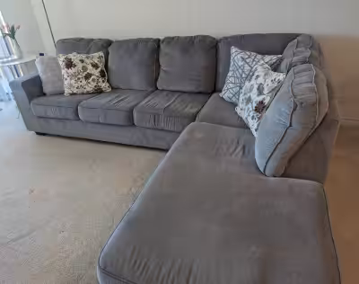 Sleek and comfortable Altari 2-Piece Sectional couch by Ashley Furniture. Designed in a contemporary...