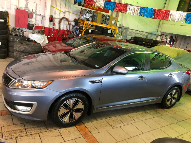 2012 KiA OPTiMA HYBRID PREMIUM/ CUIR/ CAMÉRA/JAMAIS ACCIDENTÉ dans Autos et camions  à Ville de Montréal