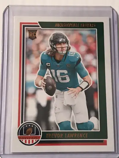 New and mint Panini Football Trevor Lawrence Rookie Cards. Prestige and Stars & Stripes. Both in pro...