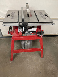 Table saw with stand and sawdust capture bag