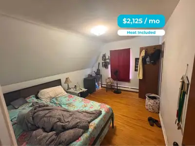 THE SPACE & NEIGHBORHOOD Welcome to 49 Quinton Ave. This expansive 4-bedroom apartment offers a gene...