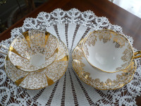 BONE CHINA FROM ENGLAND TEACUPS AND SAUCERS IN GOLD DESIGN