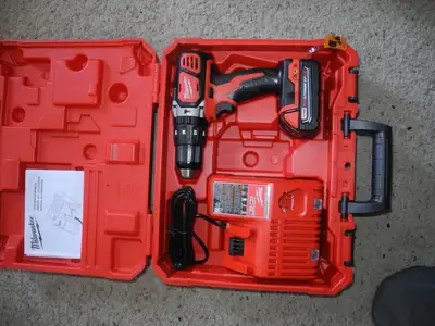 Milwakee New  Drill with battrey and charger, View more