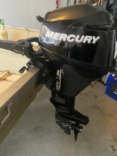 Selling a 2008 9.9 hp short shaft mercury outboard four stroke motor, hose and tank. Starts easily a...