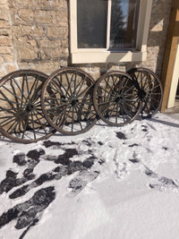 Antique wooden wagon wheels 