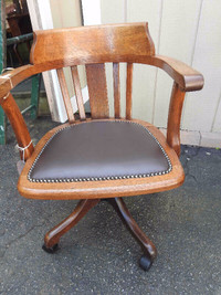 vintage antique swivel office chair.. nice curved back