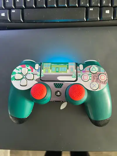 This is the Alpine Green special edition PS4 controller with the eXtremeRate Textured Black Grip and...