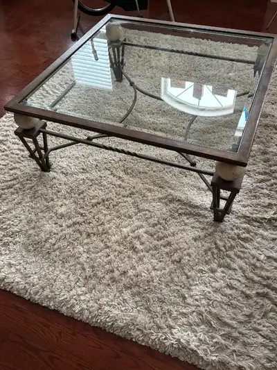 Glass and wrought iron coffee and side table. $200 for pair.