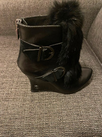 Black leather wedge ankle boots in new condition, size 6