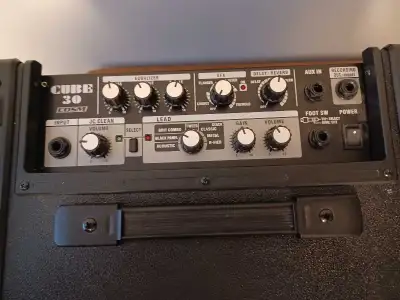 Roland Cube 30, excellent condition, 10" speaker, 30 watts, built-in effects.