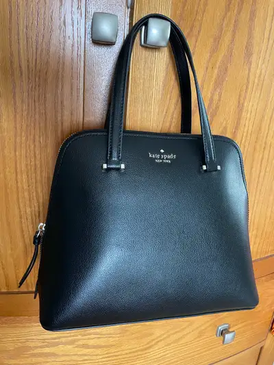 Price drop. Brand new black saffiano leather. 11.5” x 9.5” x 5 Handbag or shoulder/crossbody with de...