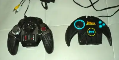 .......2005 darth vader star wars plug n play tv game and 2004 batman plug n play tv game..both are...