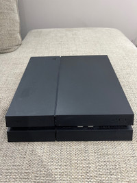 PS4 console with controller and charger