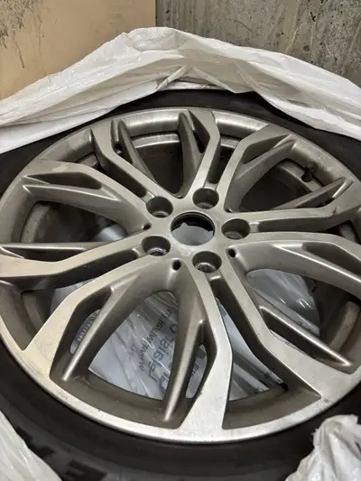 Selling 4 rims and tires for 2018 X1 tires are all season Pirelli run flats but they are very used....