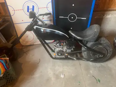 750 obo or trade for go kart mini bike. Mini chopper 7 feet long new paint new light new engine come...