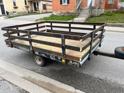 Tilts for easy loading Removable sides Used to transport an ATV Tie down hooks installed on floor Fl...