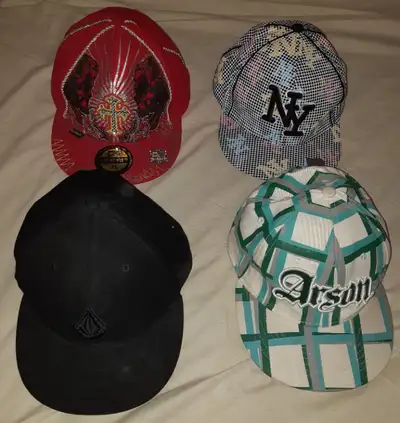 4 ball caps as shown. $20 each or $60 for all 4. If the ad is up the caps are still available. “Hi,...