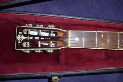 I decide to sell my beautiful southern jumbo style acoustic guitar, with a 12 fret to the body desig...