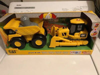 Toy bulldozer - CAT truck bulldozer Press & Roll $50, new in box