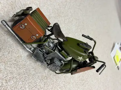 This unique Harley Davidson is made entirely of metal to replicate a vintage Harley! 13” in length &...