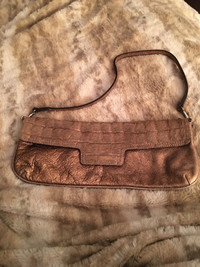 Gold leather clutch bag.  Made in italy