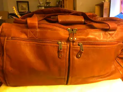Large brown Canyon Outback leather duffel bag with wheels, View more