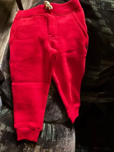 Get your little one ready for playtime with these Ralph Lauren red sweatpants, size 2T. These pants...
