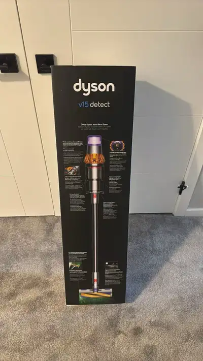 New Dyson V15 Detect vacuum cleaner. Box shows it has 60 minutes run time, whole-machine advanced fi...