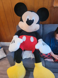 Mickey Mouse life size stuffed animal.