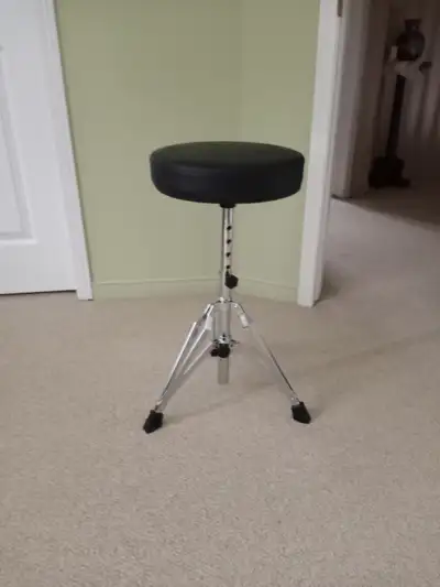 Adjustable Drum Stool Adjustable from 18-23in Patched cut on side $25