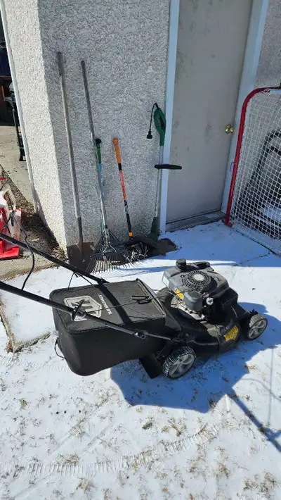 lawn mower and gardening tools, View more