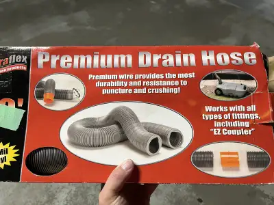 RV drain hoses NIB box is a little rough, also includes adapter to connect to trailer pipe. $22