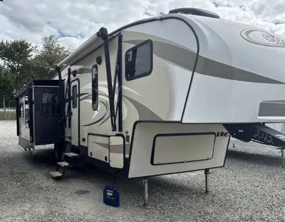 I am selling a Keystone Cougar Fifth Wheel, perfect for family adventures and cross-country travel!...
