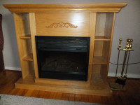 For Sale A DIMPLEX Electric Fireplace. Top is 55" X 15 3/4" Base