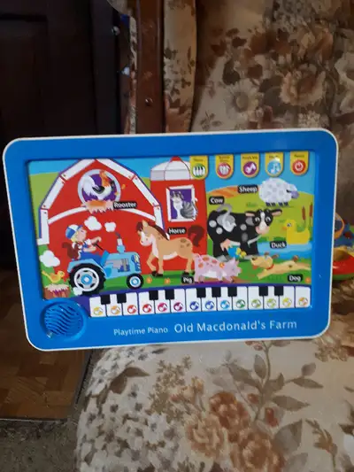 This is a Playtime Piano "Old MacDonalds Farm" electronic toy Made by Scientific Toys Inc. It plays...