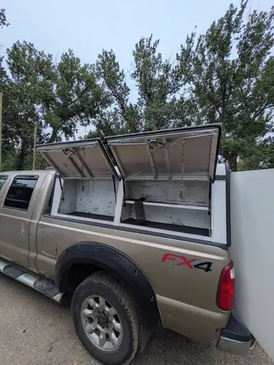 ARE Utility canopy. 6'9" Length 6' Wide Make an offer. Truck is unable to deliver, pick up in Roseda...