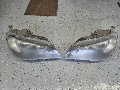 Bmw e70 x5 headlights Came off a 2011 e70 x5 msport Perfect working condition no damages Comes Compl...