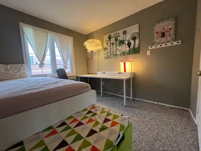 If you see this ad, room is available. A cozy bedroom in a family townhouse condo, for a: female int...