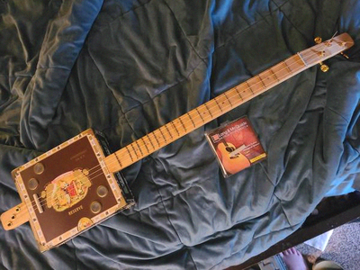 3 string Cigar box guitar with new strings, View more