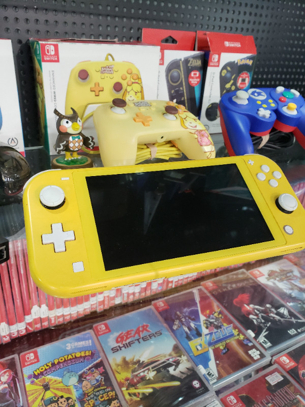 Nintendo Switch Lite with charger in Nintendo Switch in Cole Harbour