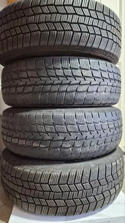 Set of four General Altimax Arctic winter tires mounted on original Hyundai 16-inch alloy rims. Tire...